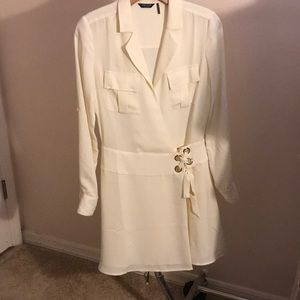Ivory long sleeve dress. Never been worn.